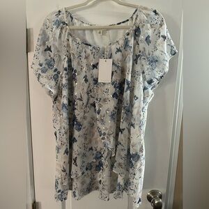 Tamara H.  Blue and White Floral Blouse. Short sleeve, 2X, 28” long